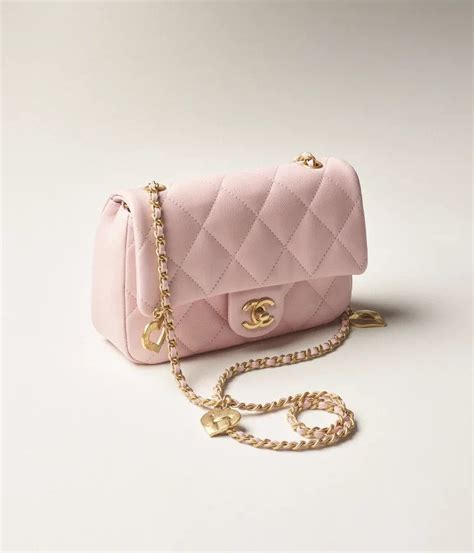 chanel pink bag with pearls|chanel bag with charms.